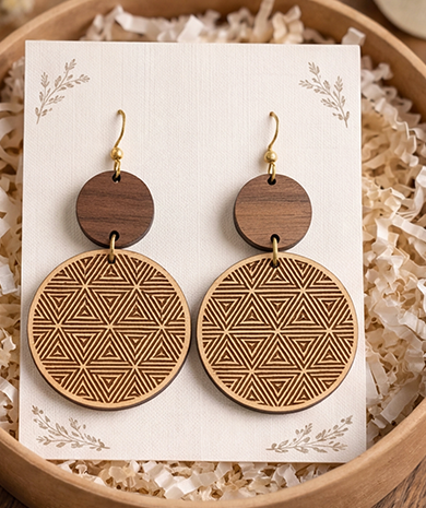Wooden earrings engraved with a geometric pattern