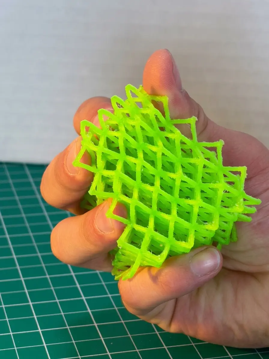 Flexible green TPU lattice compressed by hand